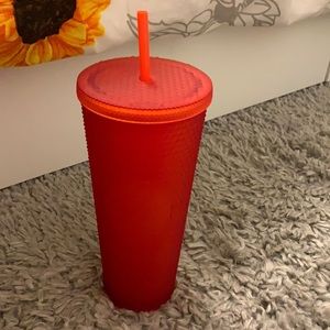 Red stud Starbucks cup
